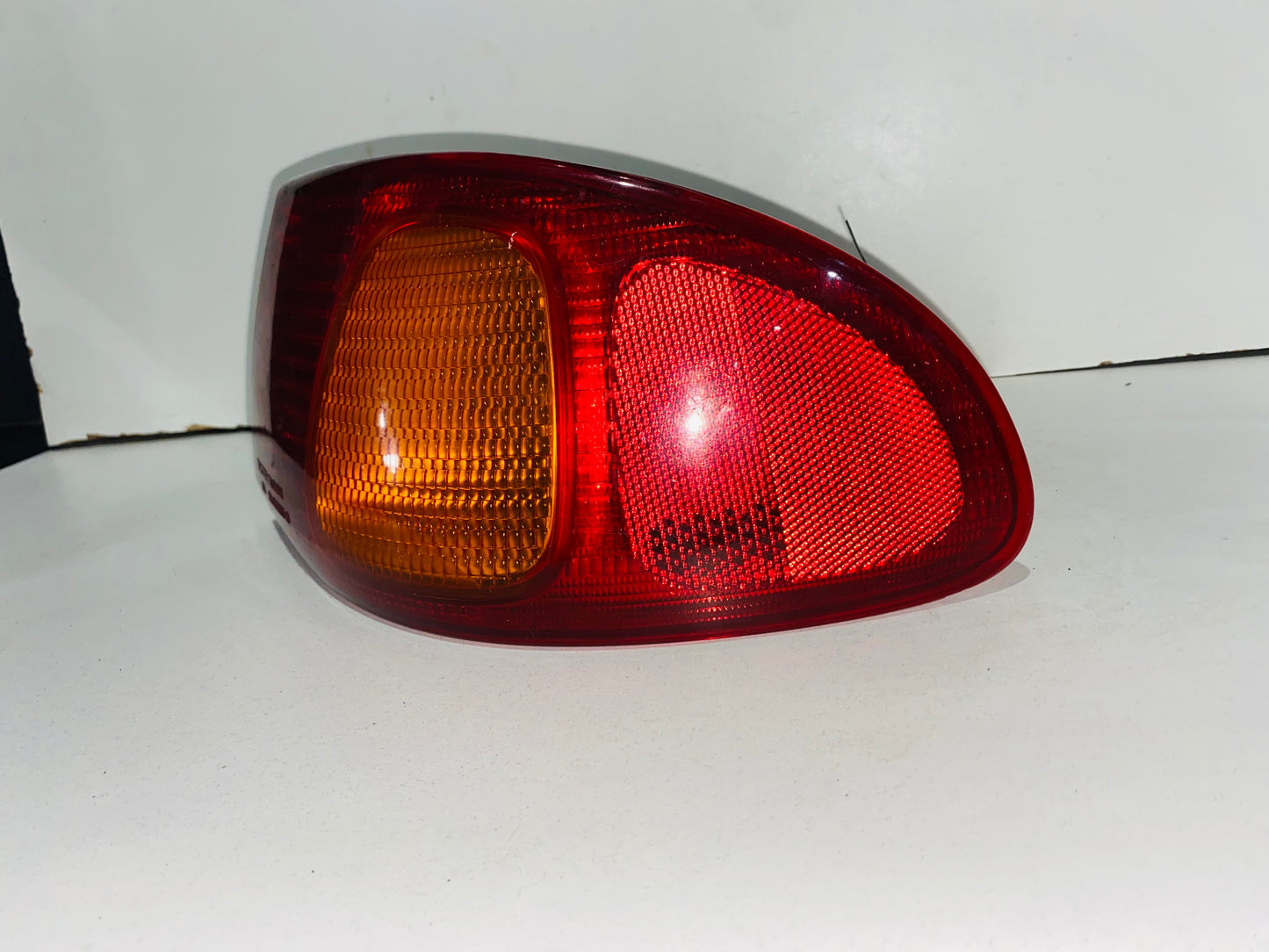 STOP IZQUIERDO PARA TOYOTA COROLLA (1998-2002)