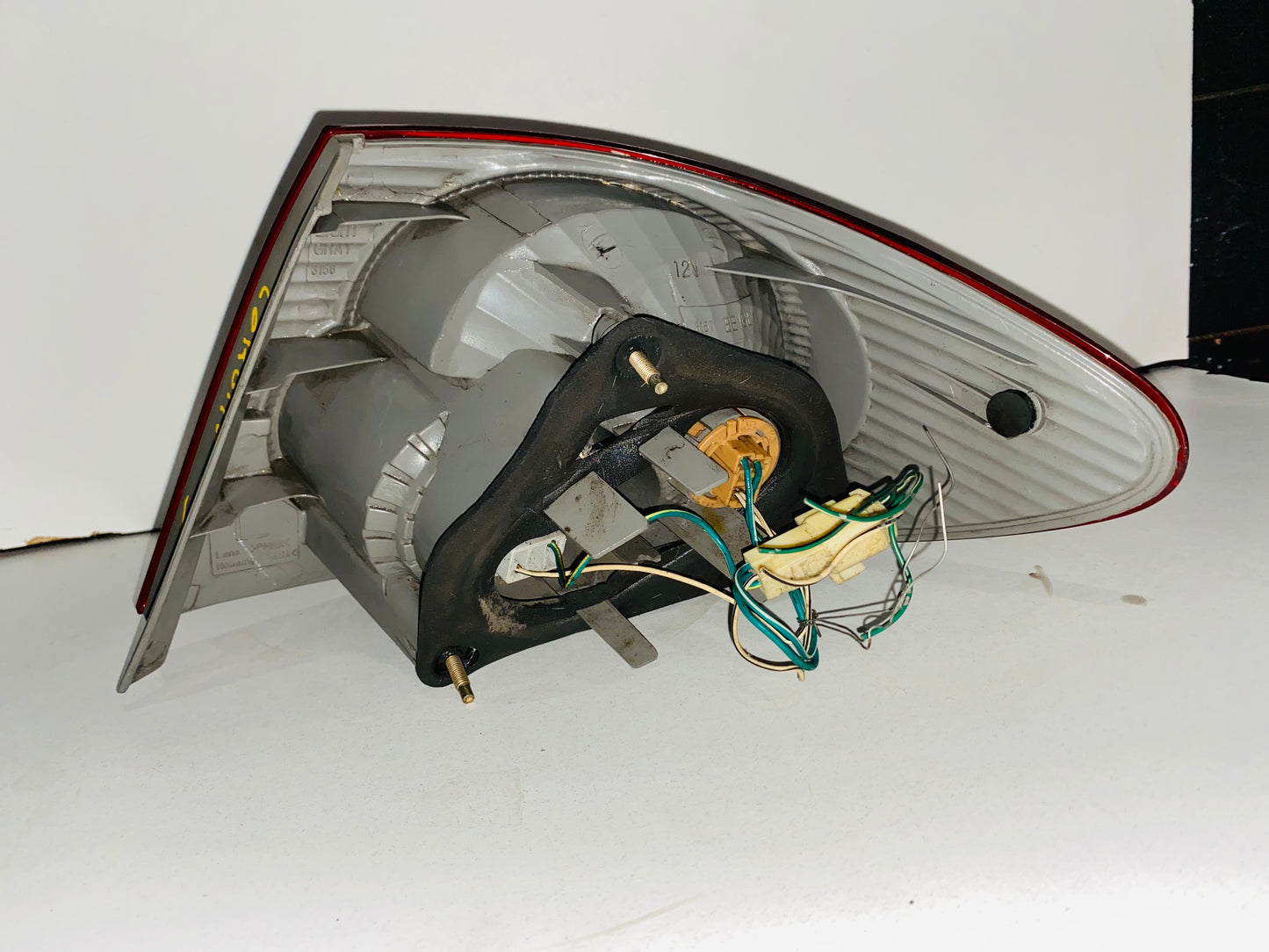 STOP IZQUIERDO PARA TOYOTA COROLLA (2003-2004)