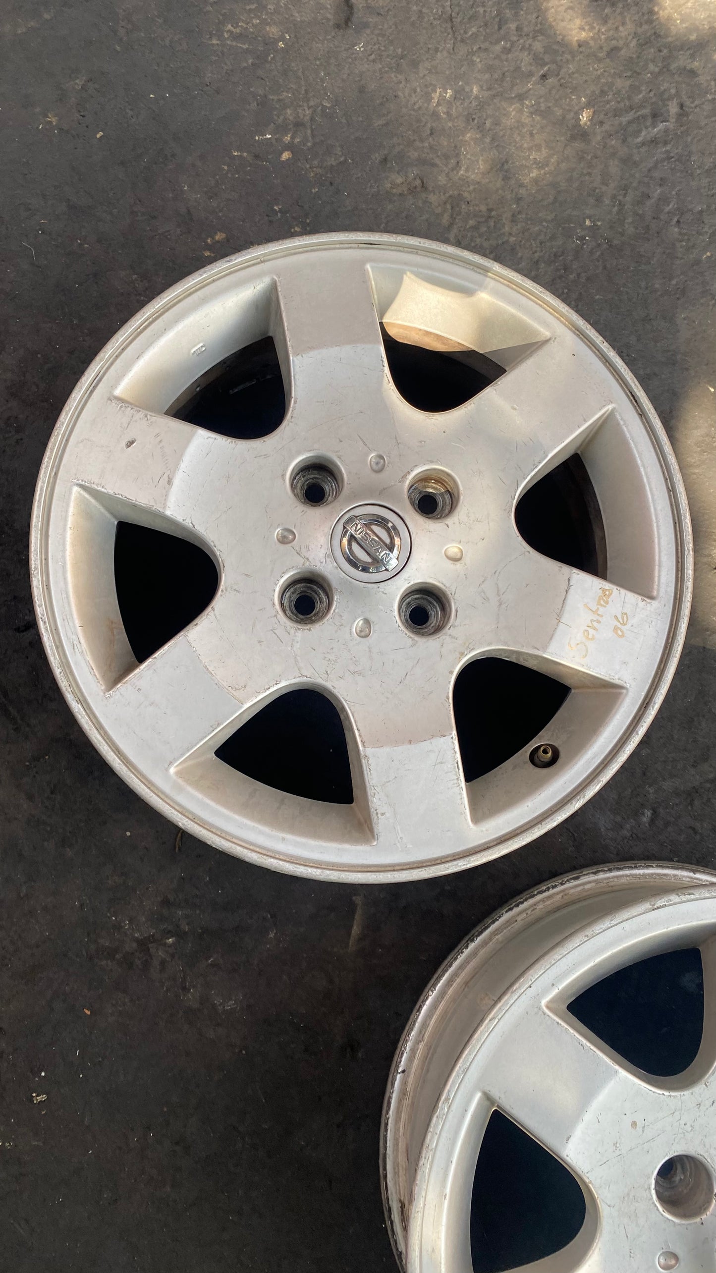 PAR DE AROS NISSAN SENTRA 2006