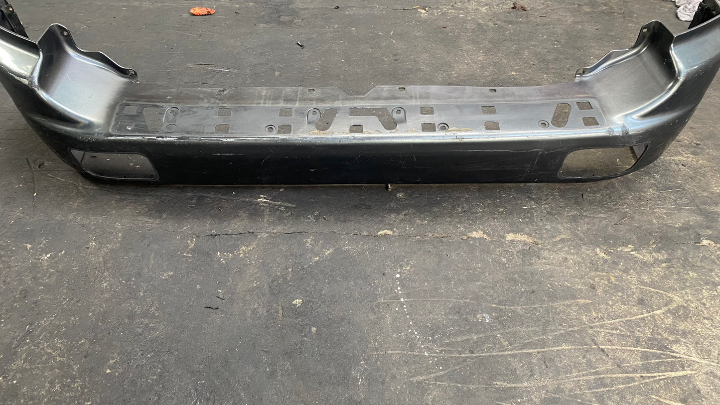 BUMPER TRASERO MITSUBISHI MONTERO 2003