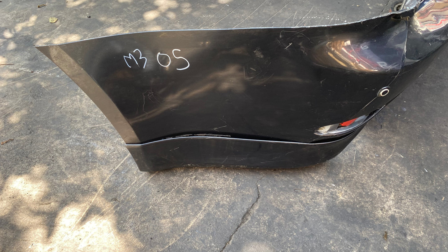 BUMPER TRASERO MAZDA 3 2005