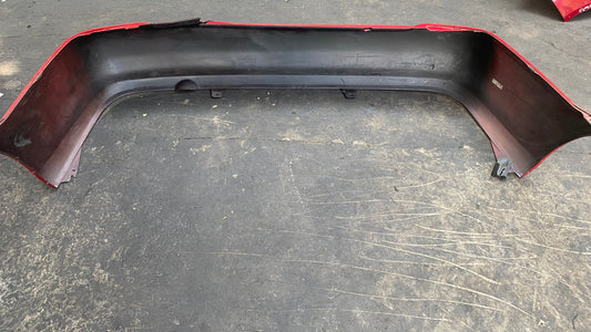 BUMPER TRASERO MAZDA PROTEGE 1999