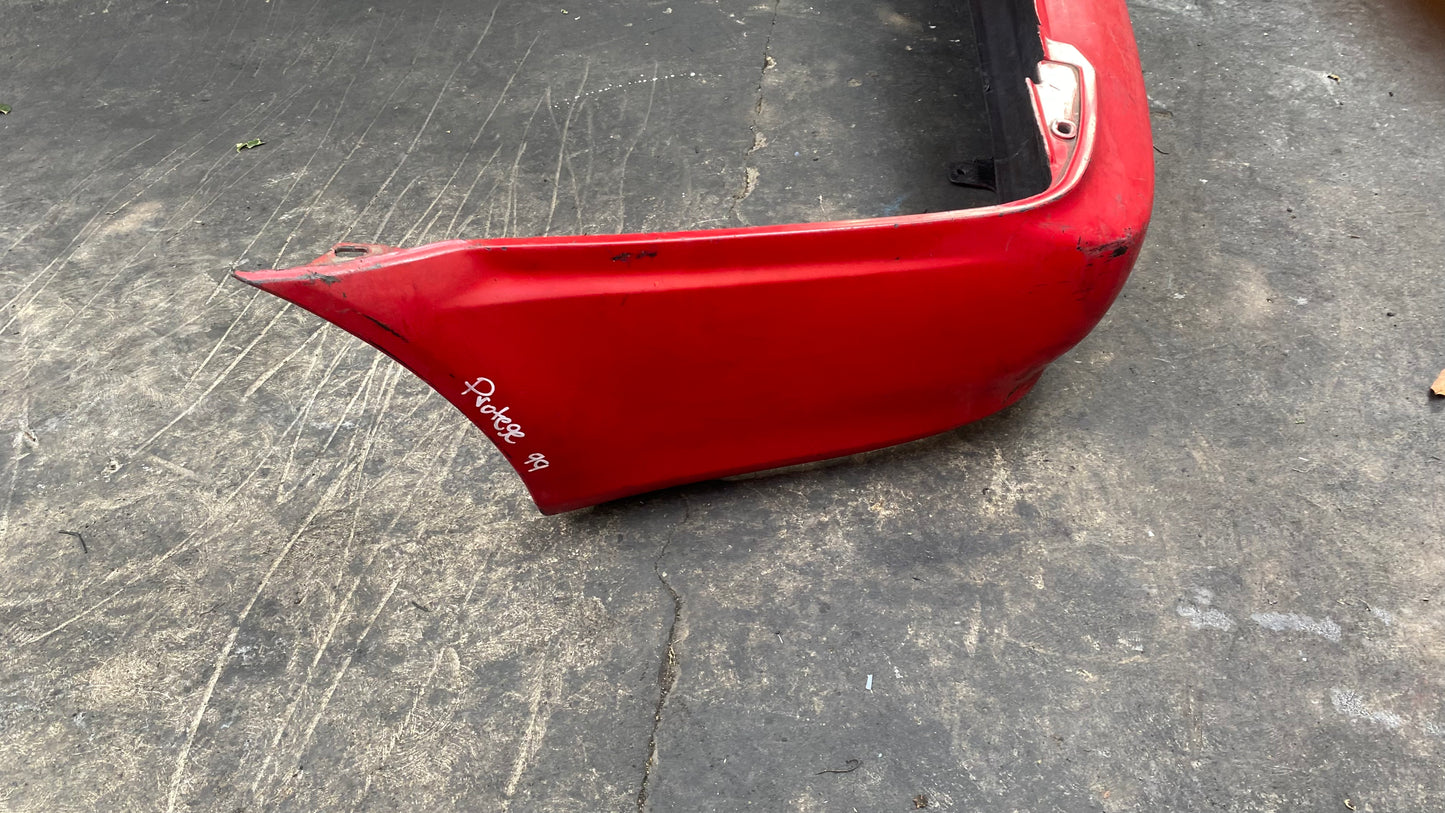 BUMPER TRASERO MAZDA PROTEGE 1999