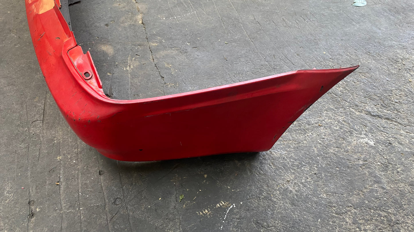 BUMPER TRASERO MAZDA PROTEGE 1999