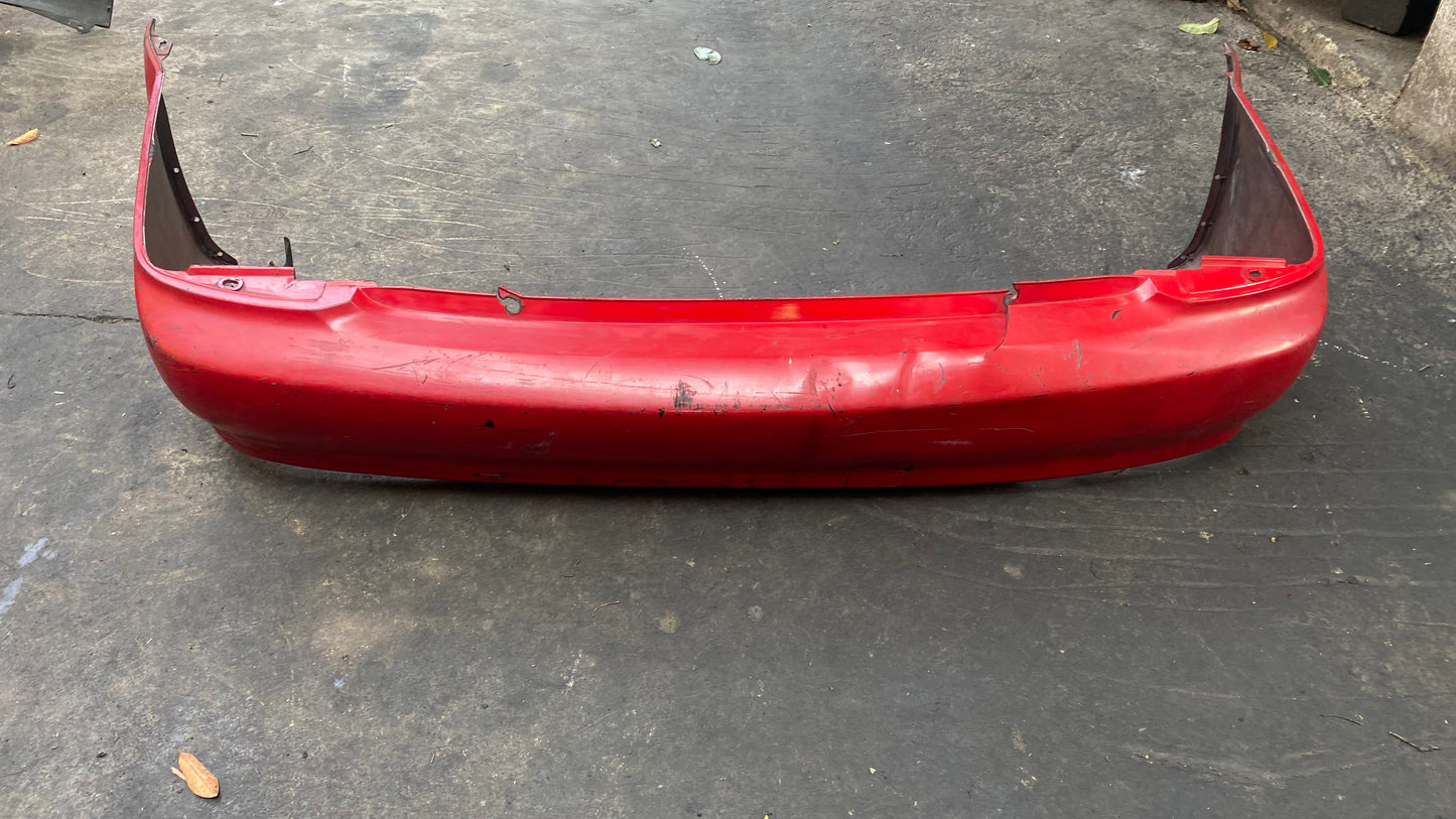 BUMPER TRASERO MAZDA PROTEGE 1999