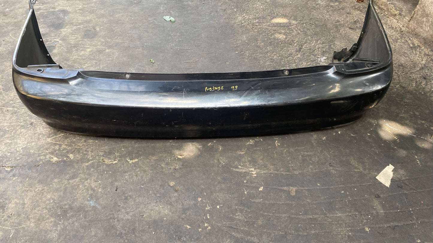 BUMPER TRASERO MAZDA PROTEGE 1999