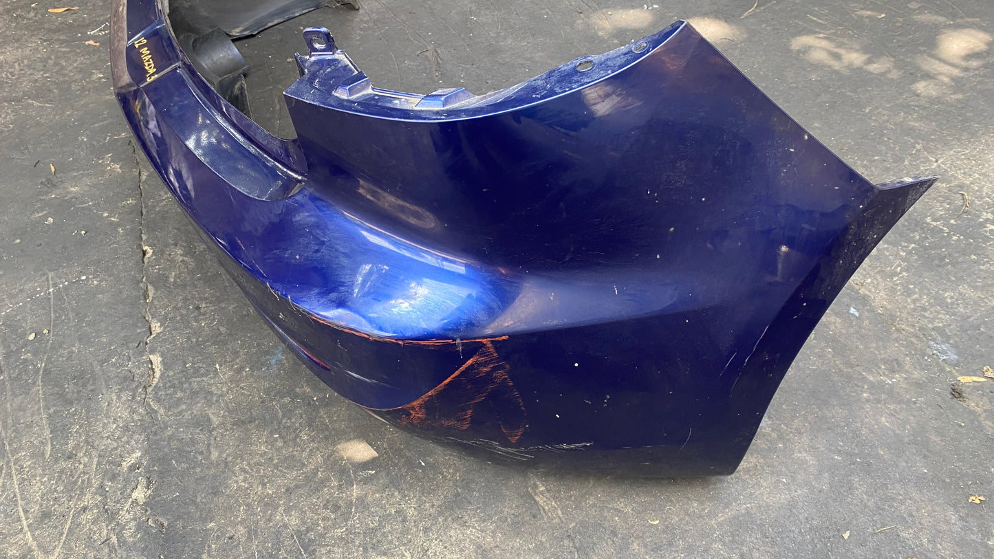 BUMPER TRASERO MAZDA 3 2012